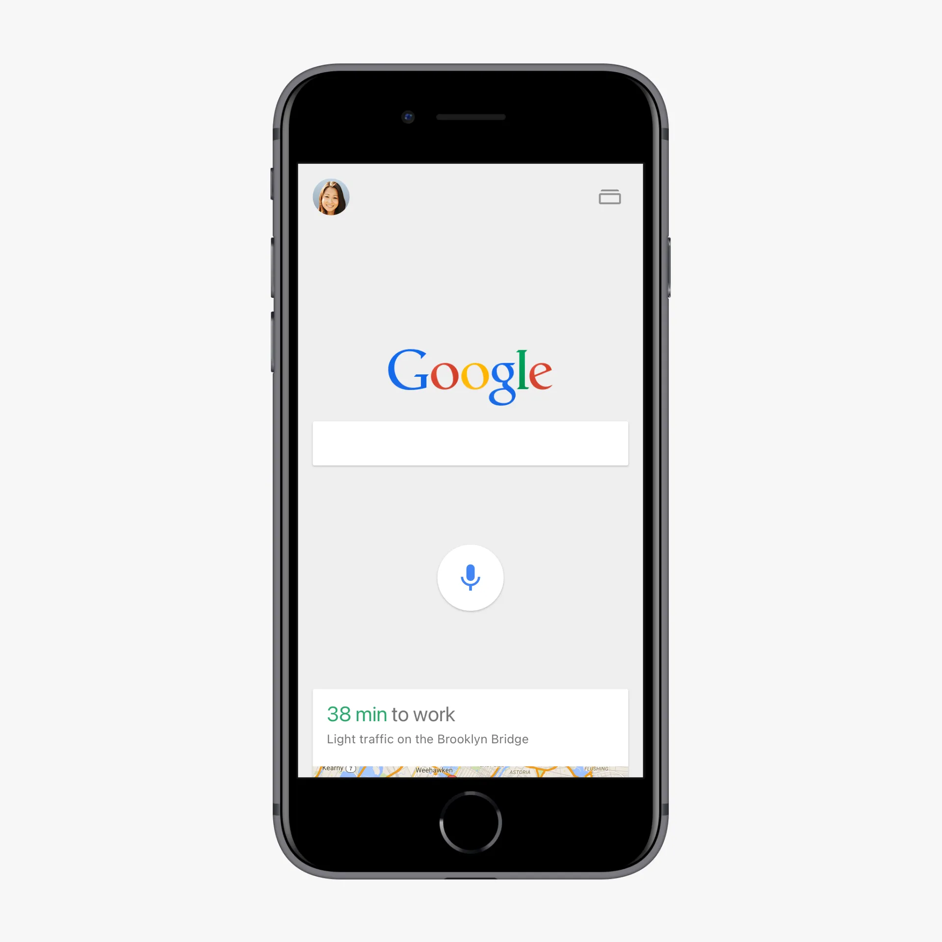 iPhone showing the Google app home screen — logo, empty search field, voice-search button, and a card reading "38 min to work"