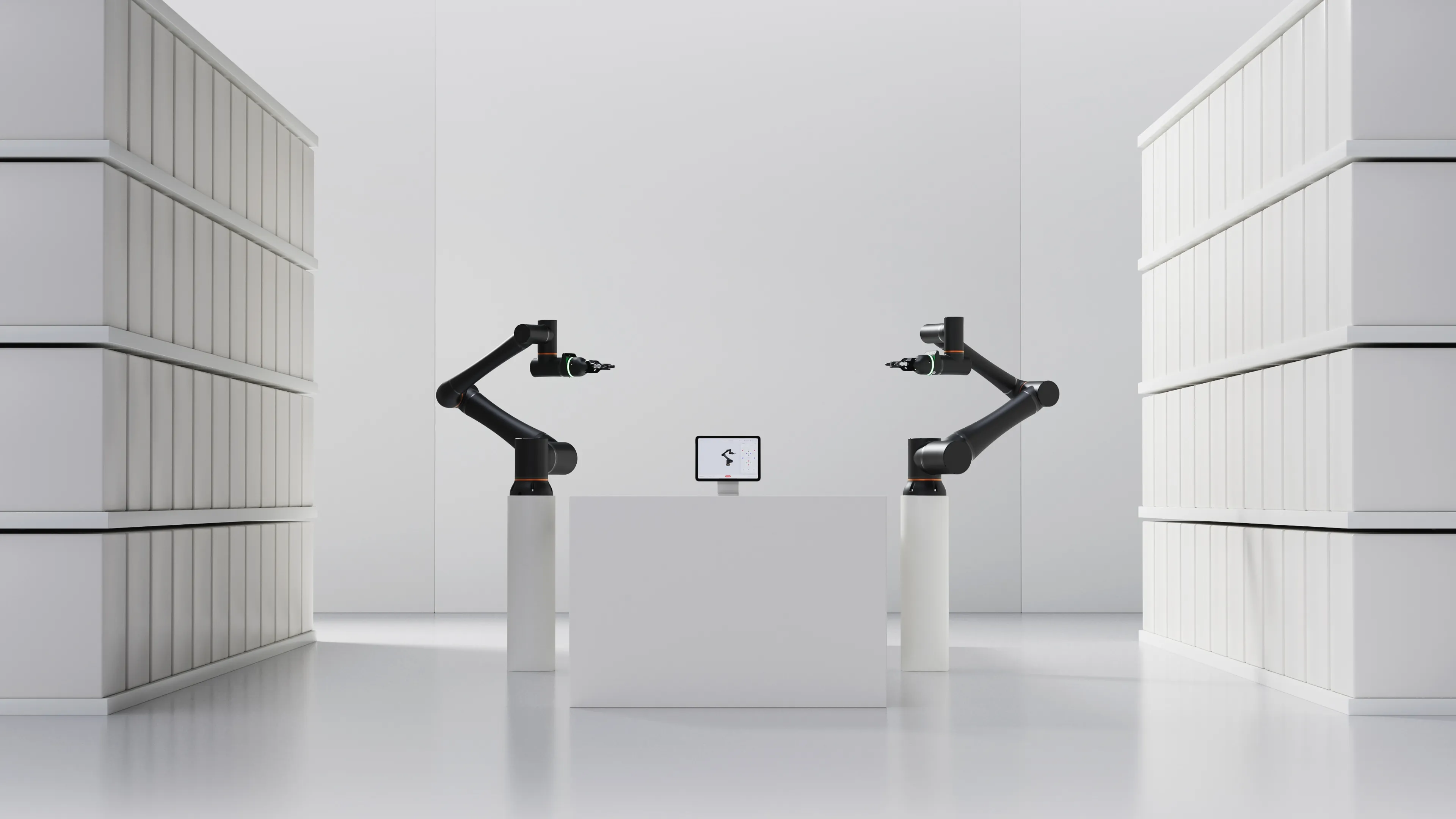 Two robot arms on plinths in a white showroom