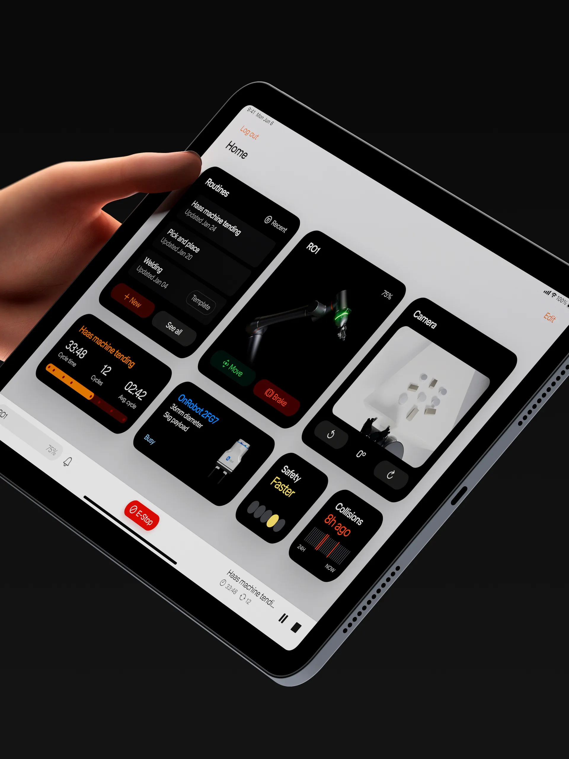 A hand holding an iPad running the robot's move controls software